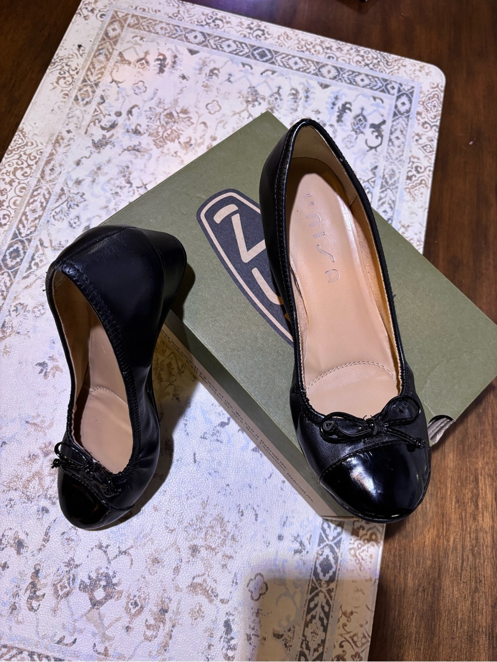 Unisa Black Leather Ballet Flats with Patent Toe and Bow